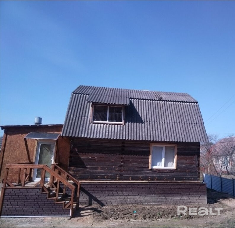 Продается дача в с/т Дубравы (Молодечненское напр., станция Пралески, 40 км от МКАД). В доме кухня, две комнаты на первом этаже, одна комната на втором. На участке туалет, душевая кабина. Вода проведена в дом, на кухню. Дом отапливается современной отопительной печью фирмы Термофор (экономичный процесс горения и тления при отличной теплоотдаче). Дополнительно имеются панели кварцевого электрообогревателя. На участке есть место для отдыха, несколько грядок с зеленью. Кусты голубики. - Bild 4
