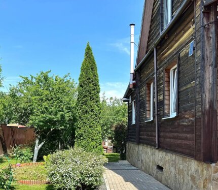 Дом рядом с Минском в живописном соседстве с сосновым лесом.